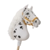 White stick horse with black spots Ireland