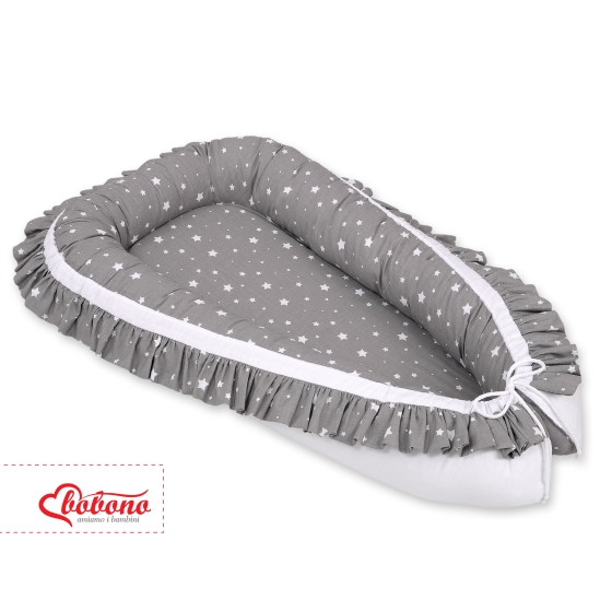 Doublesided Babynest with a ruffle - mini stars white/white