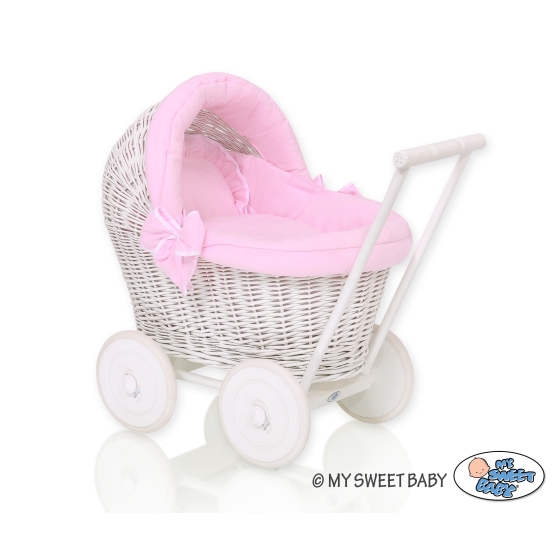 White wicker doll pram with bedding