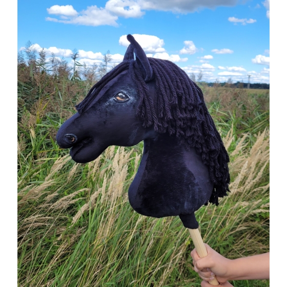 Realistic black hobby horse