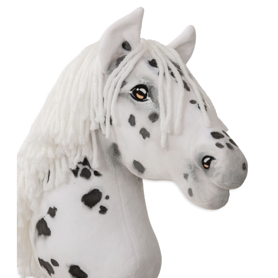 White hobby horse with black spots delivery to Ireland